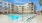 Outdoor pool with relaxing pool chairs