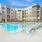 Outdoor pool with relaxing pool chairs